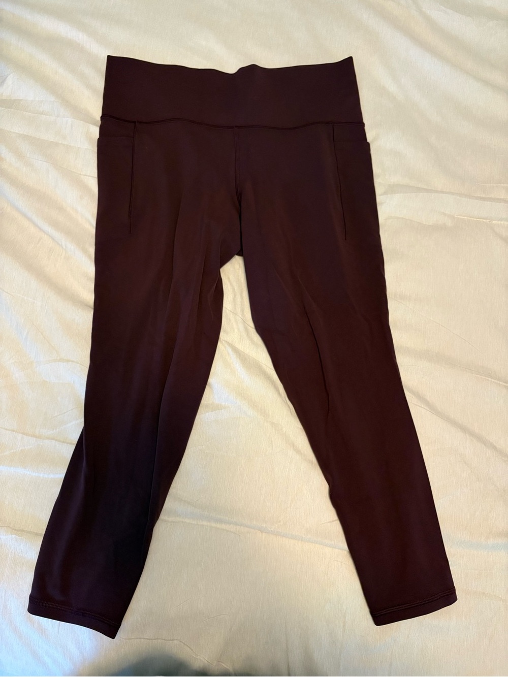Athleta salutation stash 7/8 High-Rise Leggings in Deep Wine
